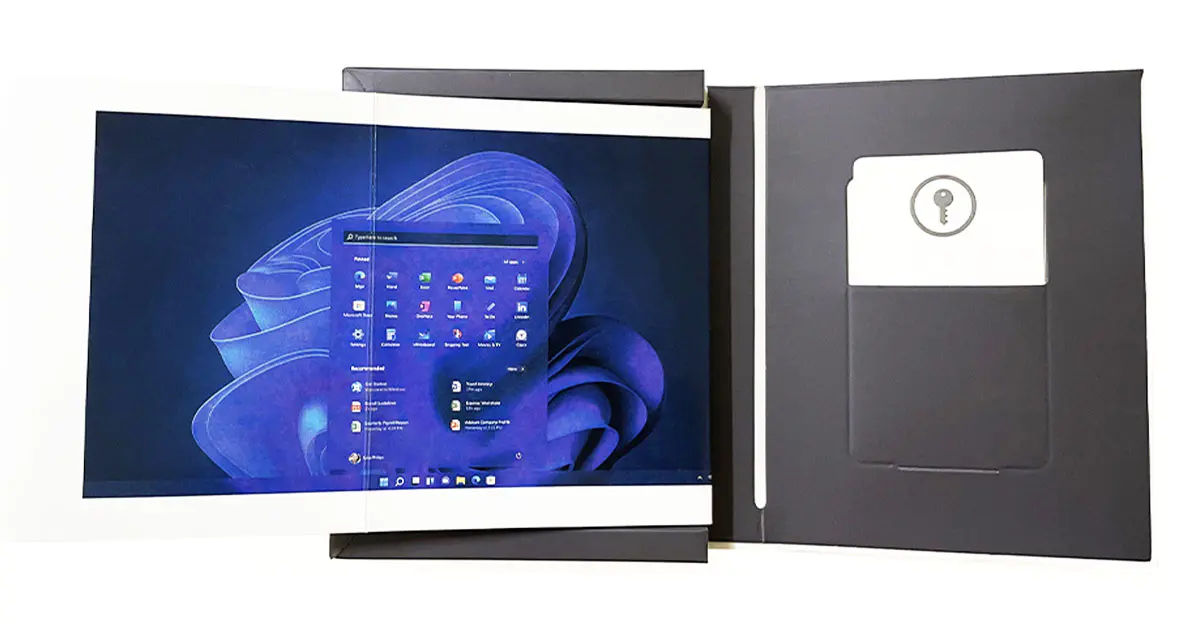 Windows 11 Pro interface and product key card